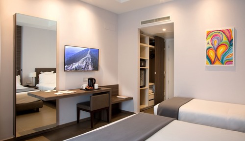 Habitación triple, vistas al jardín
