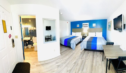 Habitación cuádruple Deluxe, 2 camas de matrimonio