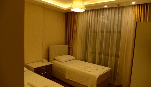 Habitación con 2 camas individuales