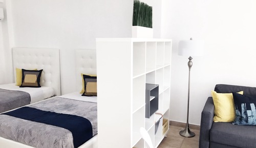 Estudio, varias camas