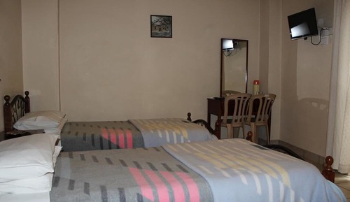 Habitación con 2 camas individuales
