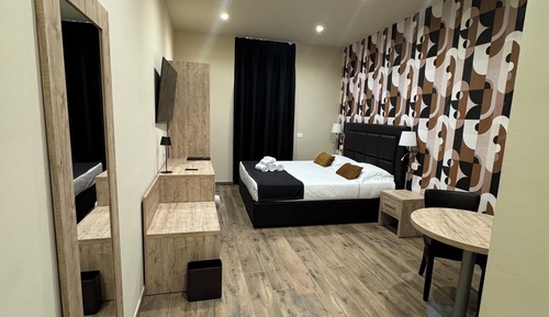 Camera Deluxe Tripla con letto aggiunto