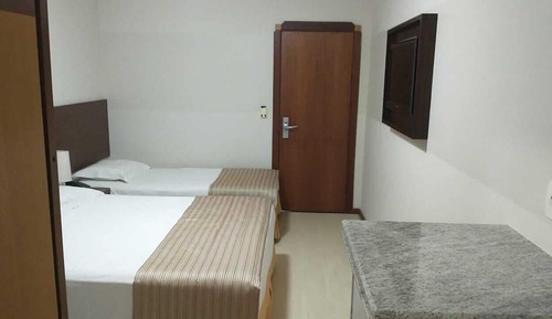 Habitación triple familiar, varias camas