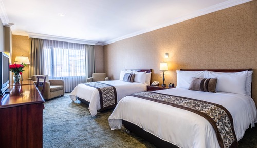 Suite junior, 2 camas dobles, vistas a la ciudad