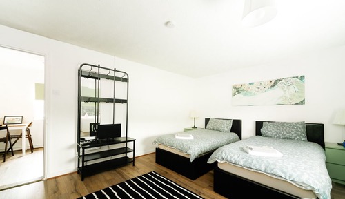 Habitación con 2 camas individuales