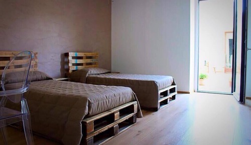 Habitación triple, varias camas
