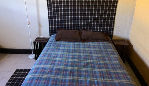 Habitación individual, baño compartido