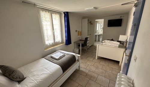 Room with two separated beds