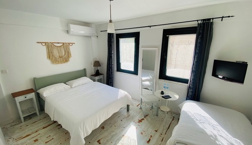Habitación triple Deluxe