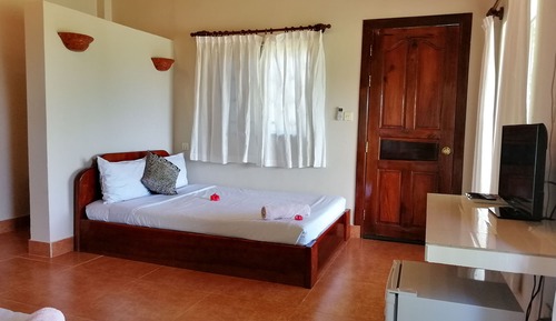 Habitación cuádruple Deluxe, 2 camas dobles, vistas al jardín