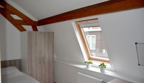 Habitación individual, baño compartido