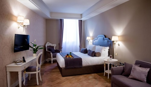 Habitación cuádruple junior, 1 cama de matrimonio grande con sofá cama, vistas a la ciudad
