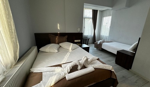 Habitación triple estándar, vistas parciales al mar
