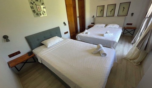 Habitación triple superior, 1 habitación, vistas al jardín