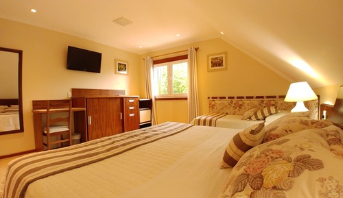 Habitación triple Deluxe