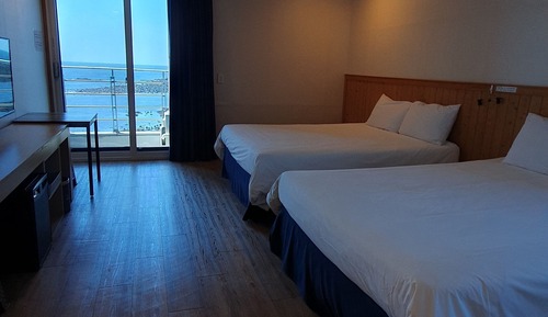 Habitación Deluxe con 2 camas individuales, 2 camas de matrimonio, vistas al mar