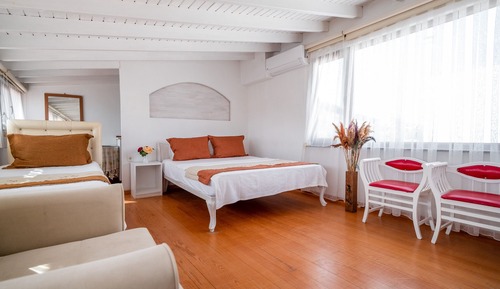 Habitación triple Deluxe