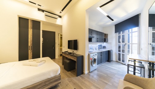 Suite estudio ejecutiva, 1 cama de matrimonio, fumadores, vistas a la ciudad
