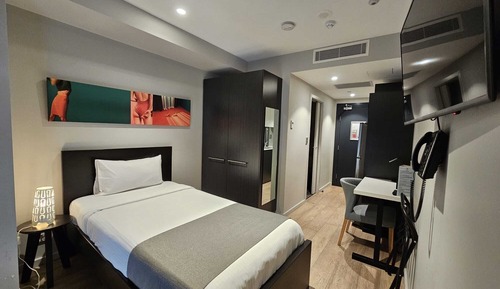 Habitación individual Deluxe, 1 cama individual, no fumadores, cocina básica