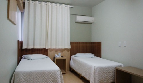 Habitación Deluxe con 2 camas individuales, varias camas