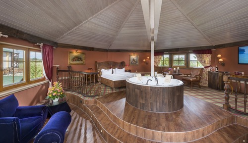 Suite superior, 1 cama de matrimonio grande, bañera de hidromasaje, vistas al lago