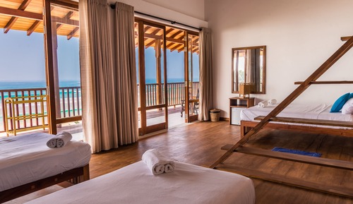 Habitación familiar, varias camas, vistas al mar, frente al mar