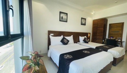 Habitación triple Deluxe, vistas al mar