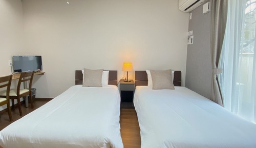 Habitación superior con 2 camas individuales, varias camas, no fumadores