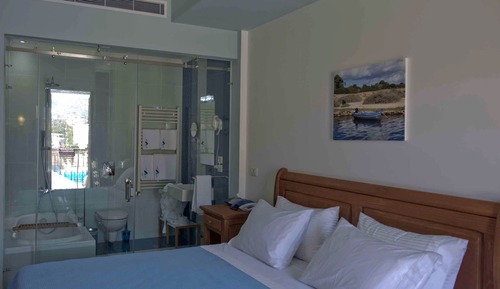 Habitación Deluxe doble, bañera, vistas parciales al mar