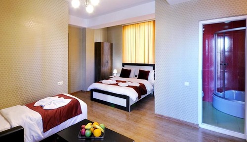 Habitación triple Deluxe