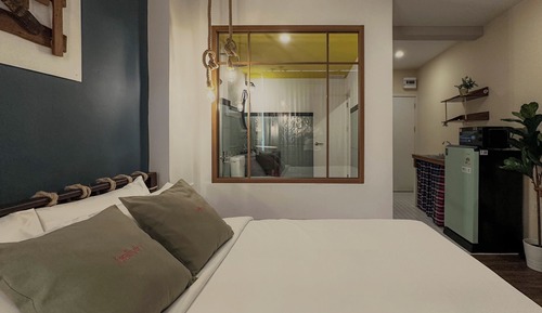 Habitación Deluxe doble, 1 cama de matrimonio grande, baño privado, vistas a la ciudad