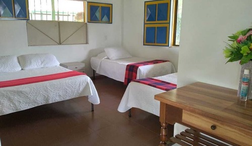 Habitación cuádruple familiar, vistas al jardín