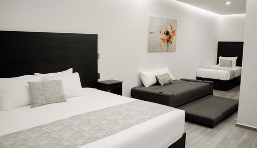 Habitación familiar, varias camas