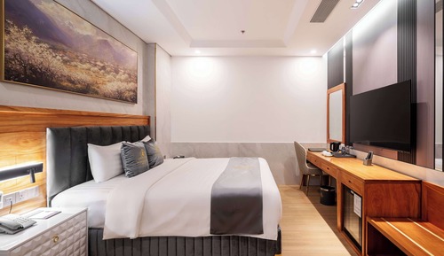 Habitación Deluxe doble, 1 cama de matrimonio grande (DELUXE KING)