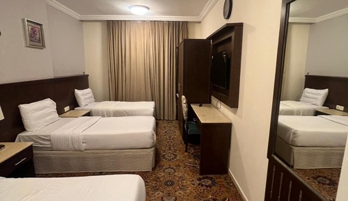 Deluxe Triple Room, City View