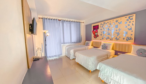 Habitación triple Deluxe, vistas al jardín