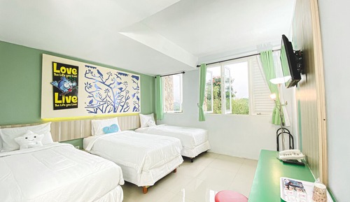 Habitación triple Deluxe