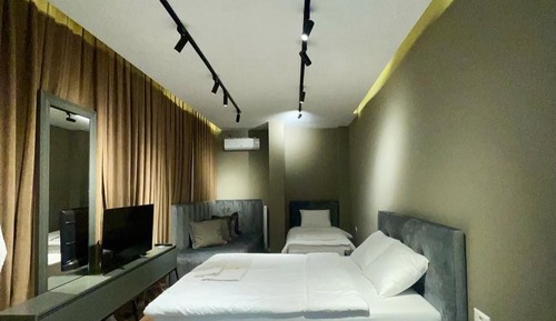 Habitación triple, vistas a la ciudad