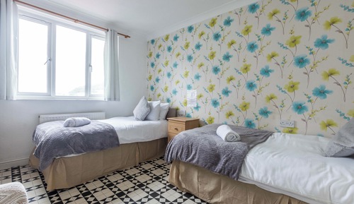 Habitación con 2 camas individuales