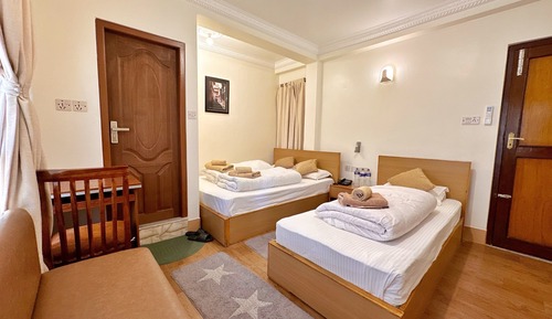 Habitación triple Deluxe, balcón