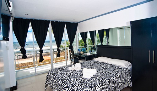 Suite Deluxe, 2 camas de matrimonio, no fumadores, vistas a la playa (2nd Floor)