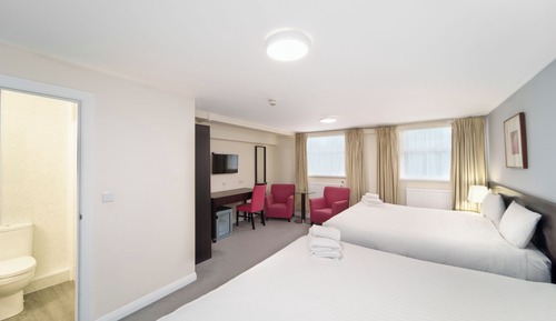 Habitación cuádruple familiar, varias camas