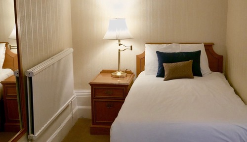 Habitación individual económica, baño privado