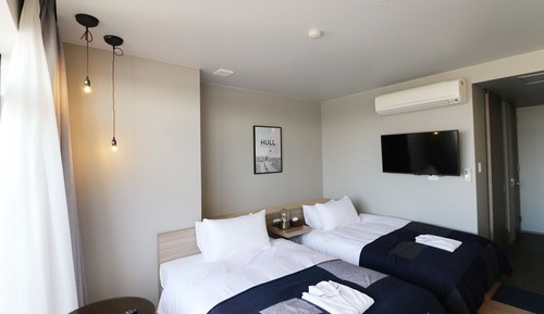 Habitación con 2 camas individuales, no fumadores, baño compartido (Ocean view , &sofa bed 208)