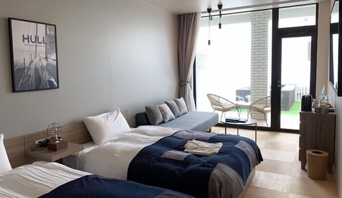 Habitación Deluxe con 2 camas individuales, no fumadores (Garden, &sofa bed, only Shower 103)