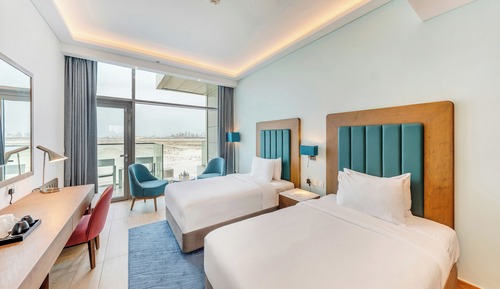 Habitación superior con 1 cama doble o 2 individuales, vistas al mar