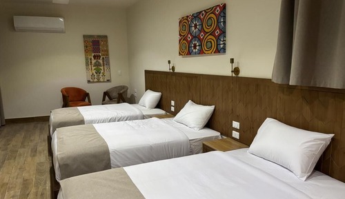Habitación triple, vistas al campo de golf