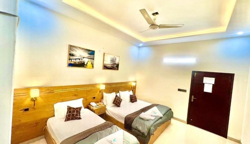 Habitación superior con 1 cama doble o 2 individuales