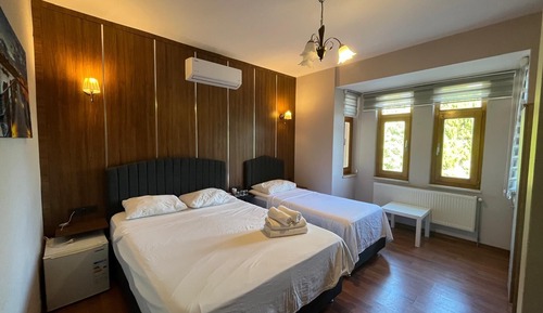 Habitación triple estándar, varias camas