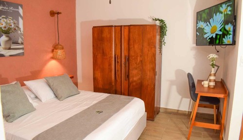 Habitación triple familiar, vistas al jardín